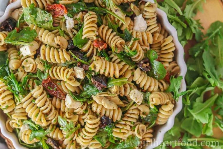 Fusilli pasta with vegetables, anthotiro and basil pesto