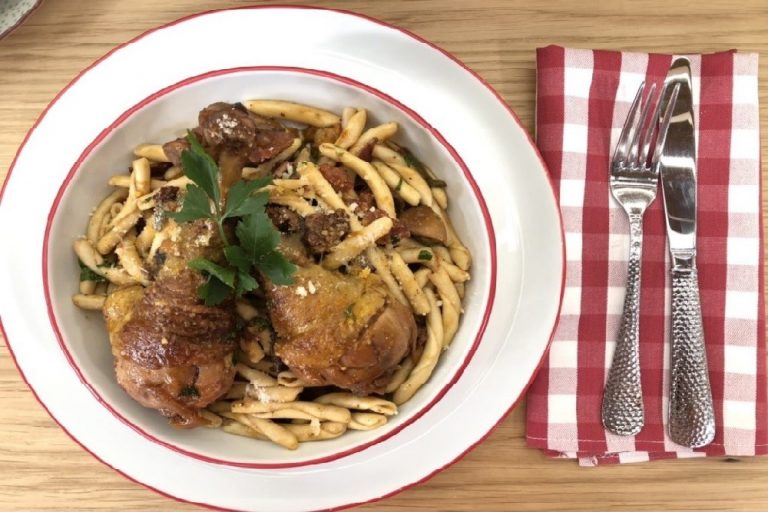 Casarecce pasta with chicken, mushrooms and bacon in red wine