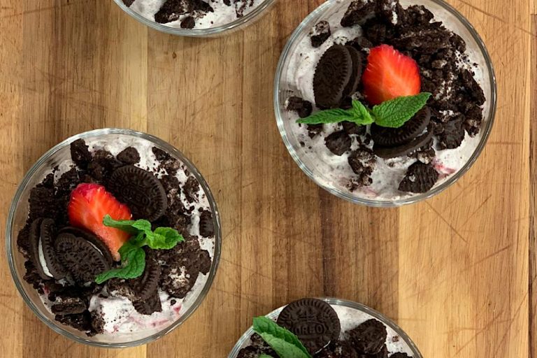 Sweet dessert with yogurt, oreo cookies and strawberries